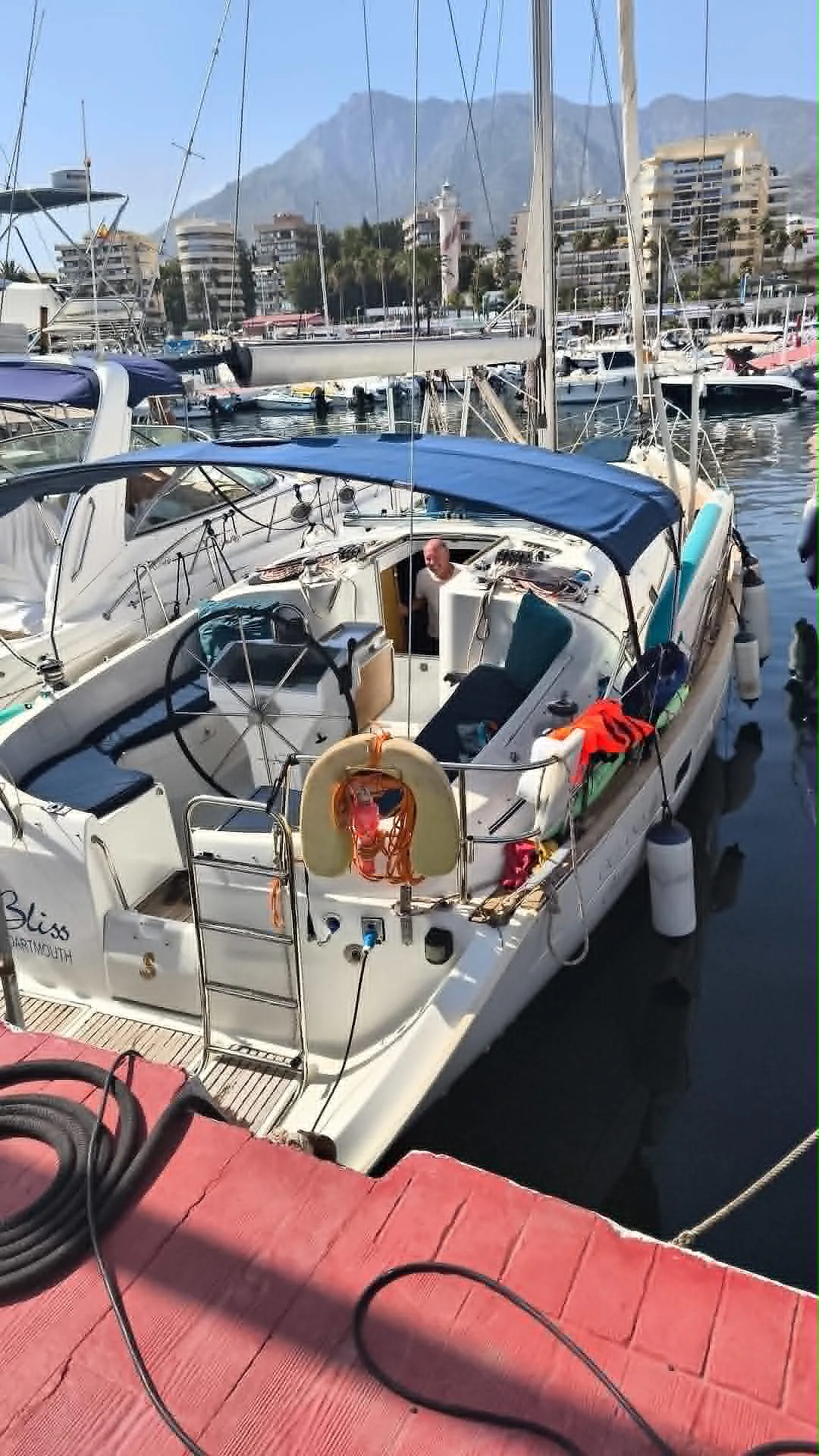 Beneteau Oceanis “Bliss” sailing yacht charter in Marbella & Puerto Banús – stern and cockpit view at the marina dock