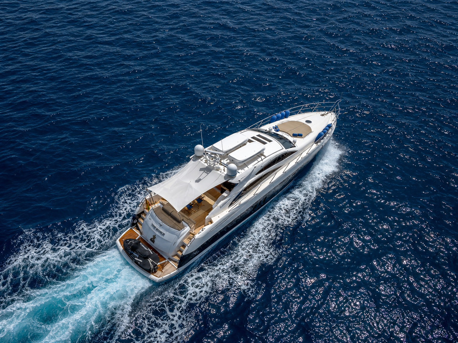 Luxury Sunseeker 72 motor yacht rental in Puerto Banús, Marbella aerial view – exclusive yacht charter